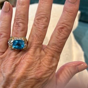 Victoria Wieck blue topaz ring . Two tone setting of silver and gold . Size 6